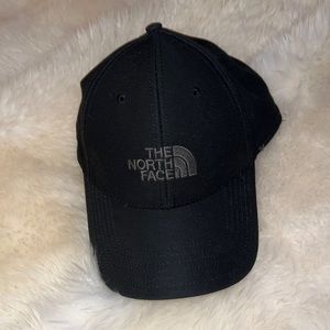 A black North Face ball cap
